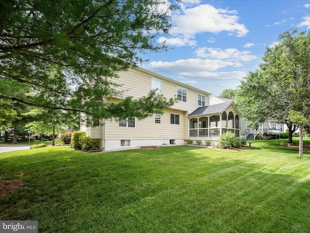 21526 Golden Autumn Pl, Broadlands, VA 20148 - back of property featuring a sunroom and a lawn