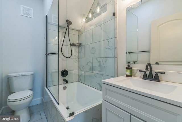 309 Bayview Rd, Edgewater, MD 21037 - full bath featuring vanity, toilet, shower / washtub combination, baseboards, and tile patterned floors