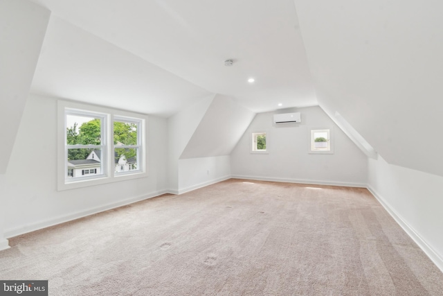309 Bayview Rd, Edgewater, MD 21037 - additional living space featuring a wall mounted AC, lofted ceiling, carpet floors, baseboards, and recessed lighting