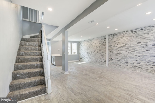 2915 Baker St, Baltimore, MD 21216 - staircase featuring wood finished floors, recessed lighting, and baseboards