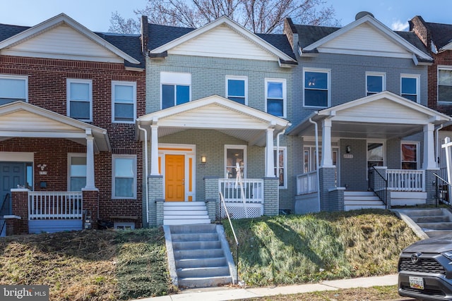 2915 Baker St, Baltimore, MD 21216 - multi unit property featuring covered porch and brick siding