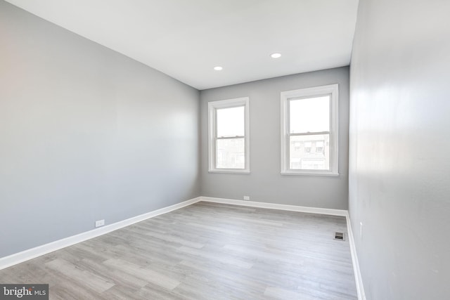2915 Baker St, Baltimore, MD 21216 - empty room featuring baseboards, wood finished floors, and recessed lighting