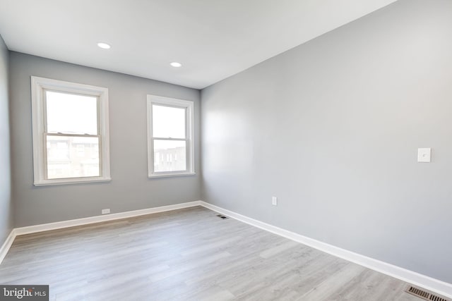 2915 Baker St, Baltimore, MD 21216 - empty room featuring baseboards, light wood-style floors, and recessed lighting