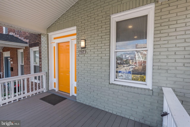 2915 Baker St, Baltimore, MD 21216 - doorway to property featuring brick siding