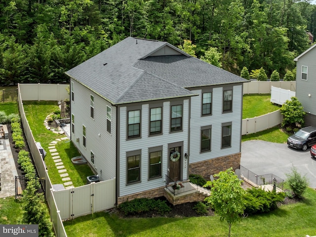 9929 Arapahoe Rd, New Market, MD 21774 - view of front of property with a gate, roof with shingles, and stone siding
