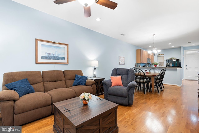 101 Colonial Downs Ct Unit 1305, Newark, DE 19702 - living room featuring a chandelier, ceiling fan, light wood-style floors, and recessed lighting