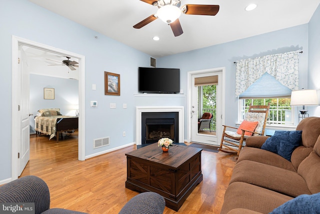 101 Colonial Downs Ct Unit 1305, Newark, DE 19702 - living area with ceiling fan, a fireplace, light wood-type flooring, recessed lighting, and baseboards