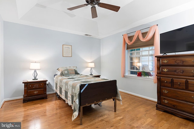 101 Colonial Downs Ct Unit 1305, Newark, DE 19702 - bedroom featuring a raised ceiling, wood finished floors, baseboards, and ceiling fan