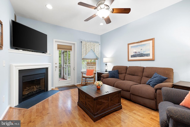 101 Colonial Downs Ct Unit 1305, Newark, DE 19702 - living room with ceiling fan, a glass covered fireplace, light wood-style floors, recessed lighting, and baseboards