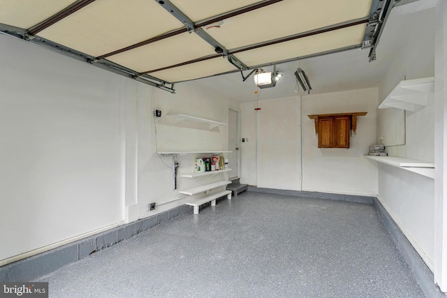 3414 Tyburn Tree Ct, Herndon, VA 20171 - garage featuring a garage door opener