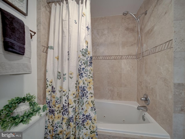 1715 15th St NW Unit 23, Washington, DC 20009 - bathroom with a combined bath / shower with jetted tub and toilet