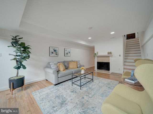1715 15th St NW Unit 23, Washington, DC 20009 - living area featuring stairs, wood-type flooring, recessed lighting, baseboards, and a fireplace with flush hearth
