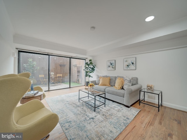 1715 15th St NW Unit 23, Washington, DC 20009 - living area with ornamental molding, wood finished floors, baseboards, and recessed lighting