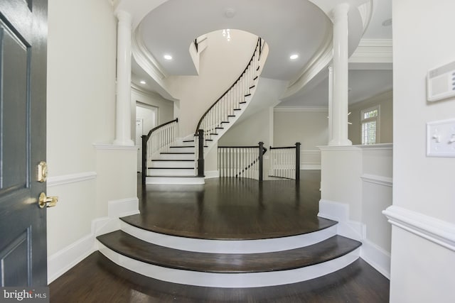 1496 Evans Farm Dr, Mclean, VA 22101 - foyer featuring wood finished floors, baseboards, decorative columns, stairs, and crown molding