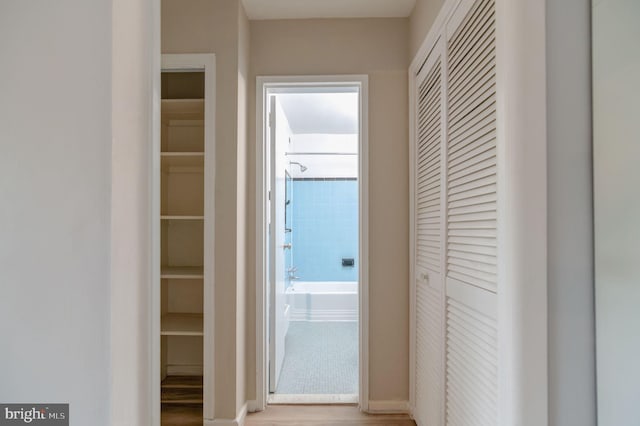 1200 S Arlington Ridge Rd Unit 205, Arlington, VA 22202 - hallway featuring wood finished floors and baseboards