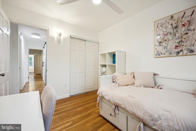 11700 Seven Locks Rd, Potomac, MD 20854 - bedroom featuring light wood-style floors, a closet, and ceiling fan