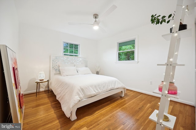 11700 Seven Locks Rd, Potomac, MD 20854 - bedroom featuring light wood-style flooring, baseboards, and ceiling fan