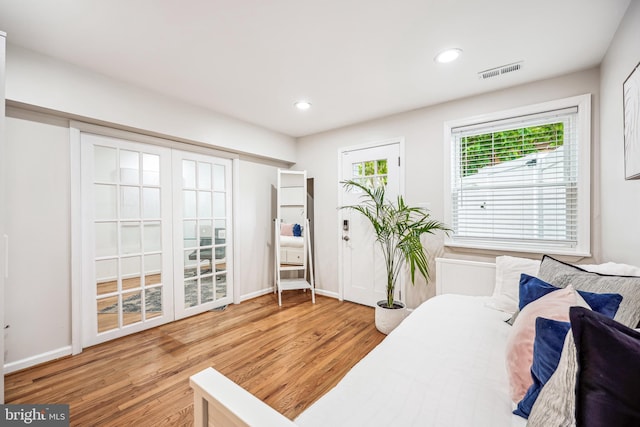 11700 Seven Locks Rd, Potomac, MD 20854 - bedroom featuring wood finished floors, baseboards, and recessed lighting