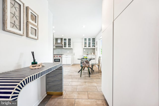 11700 Seven Locks Rd, Potomac, MD 20854 - corridor featuring light tile patterned floors and recessed lighting