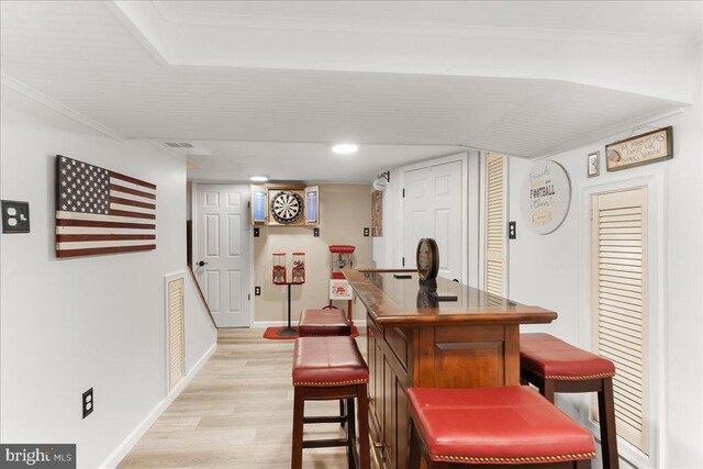 515 Terravilla Ln, Ridley Park, PA 19078 - indoor dry bar featuring light wood-type flooring, baseboards, and ornamental molding