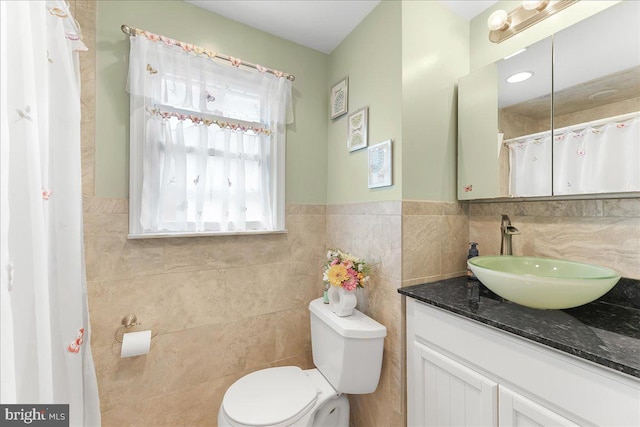 515 Terravilla Ln, Ridley Park, PA 19078 - bathroom with tile walls, vanity, toilet, and a wainscoted wall