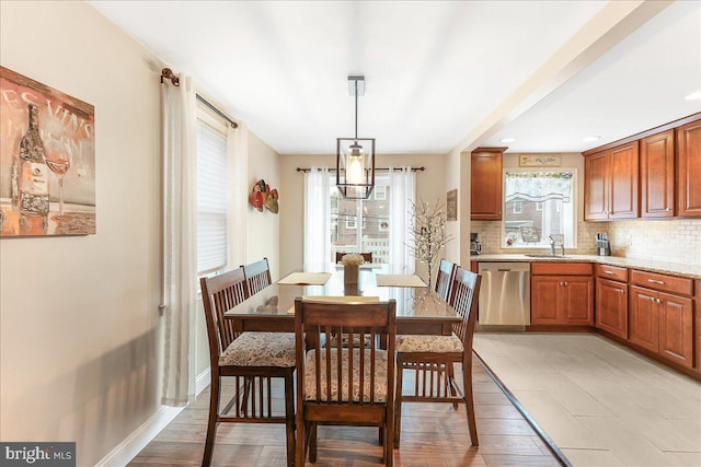 515 Terravilla Ln, Ridley Park, PA 19078 - dining room with light wood finished floors and baseboards