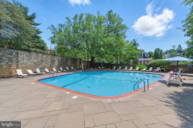 4000 Tunlaw Rd NW Unit 714, Washington, DC 20007 - community pool with a patio area