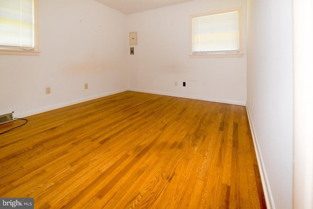 21749 Point Lookout Rd, Leonardtown, MD 20650 - empty room featuring wood finished floors and baseboards