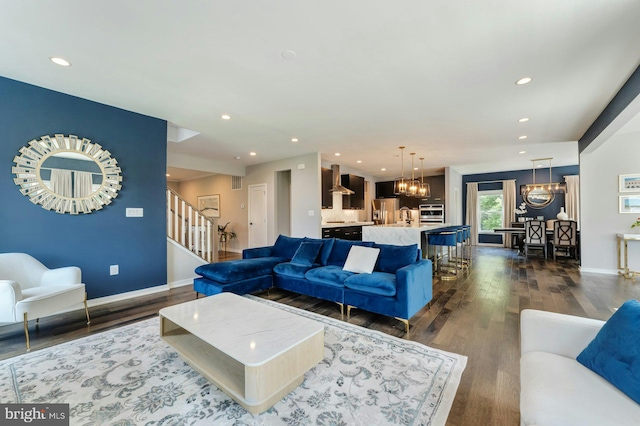 24824 Scarlet Maple Ct, Aldie, VA 20105 - living room with a chandelier, stairway, dark wood finished floors, baseboards, and recessed lighting