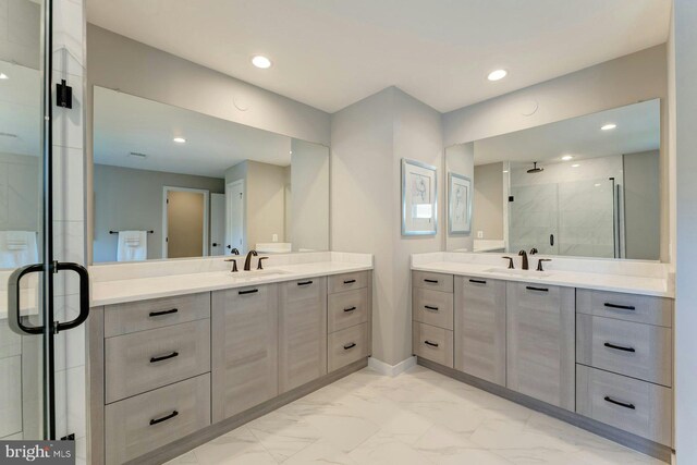 24824 Scarlet Maple Ct, Aldie, VA 20105 - full bathroom featuring marble look tile flooring, a stall shower, two vanities, and recessed lighting