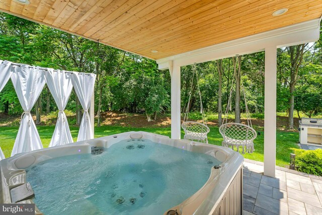 24824 Scarlet Maple Ct, Aldie, VA 20105 - view of patio with a hot tub