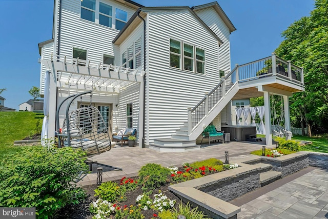24824 Scarlet Maple Ct, Aldie, VA 20105 - rear view of house with a hot tub, a patio area, a pergola, and stairway