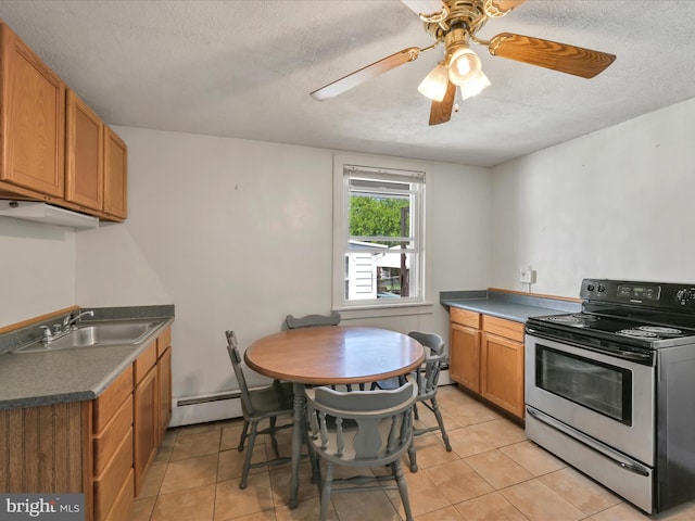 415 Parkway Ave, Schuylkill Haven, PA 17972 - kitchen with stainless steel range with electric cooktop, a baseboard radiator, a textured ceiling, a sink, and light tile patterned flooring