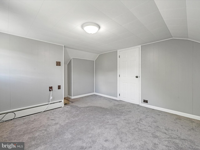 415 Parkway Ave, Schuylkill Haven, PA 17972 - additional living space with carpet floors, vaulted ceiling, a baseboard radiator, baseboards, and wood walls