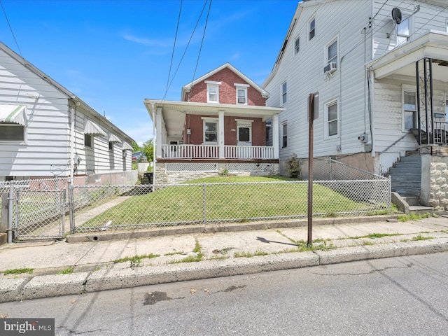 415 Parkway Ave, Schuylkill Haven, PA 17972 - view of front facade featuring a porch, stairway, and a gate