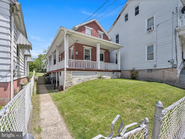 415 Parkway Ave, Schuylkill Haven, PA 17972 - view of front of house featuring a porch, cooling unit, and brick siding