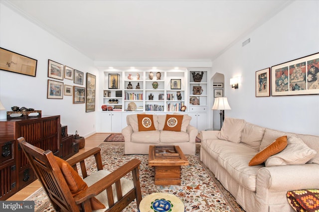 3601 Connecticut Ave NW Unit 816, Washington, DC 20008 - living room featuring light wood-style flooring, arched walkways, and built in features