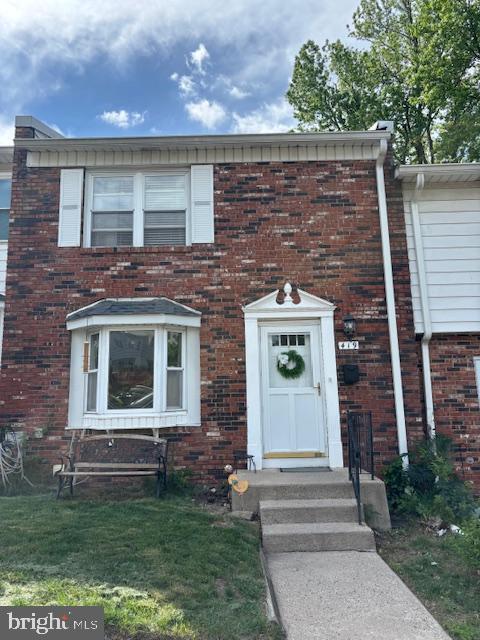 419 Rutgers Ct, Bensalem, PA 19020 - townhome / multi-family property with brick siding and a front yard