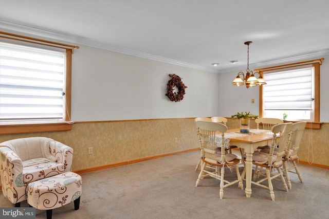108 Kennedy Blvd, Bellmawr, NJ 08031 - dining space with a chandelier, crown molding, wainscoting, and carpet