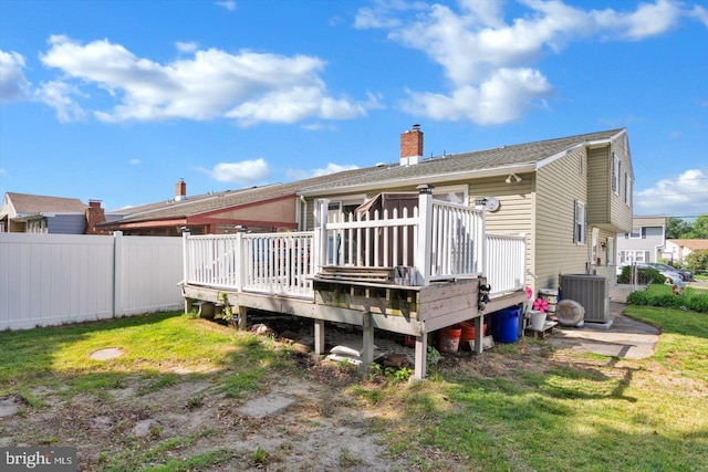 108 Kennedy Blvd, Bellmawr, NJ 08031 - rear view of house featuring a deck and a chimney