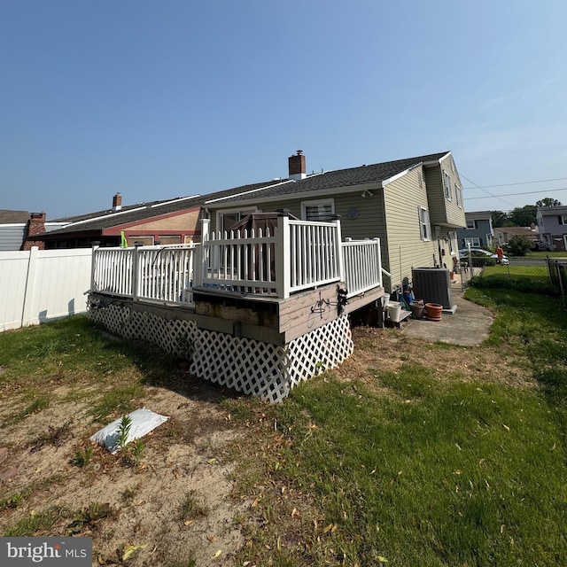 108 Kennedy Blvd, Bellmawr, NJ 08031 - rear view of property with a deck and a chimney