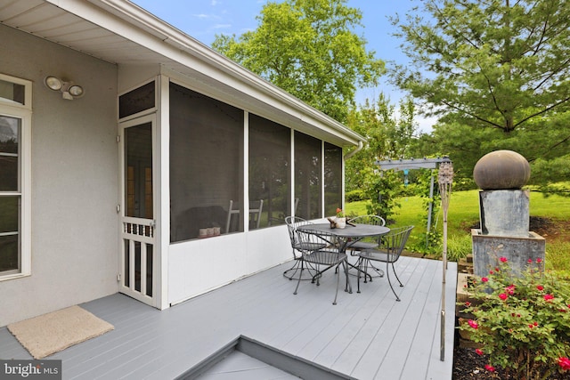 1399 N Royal Ave, Front Royal, VA 22630 - wooden deck featuring a sunroom and outdoor dining space