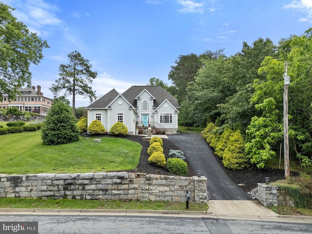 1399 N Royal Ave, Front Royal, VA 22630 - traditional home featuring a front yard, asphalt driveway, and stucco siding