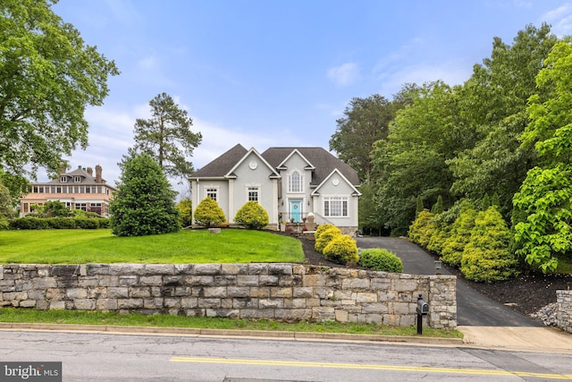1399 N Royal Ave, Front Royal, VA 22630 - view of front facade with stucco siding and a front yard