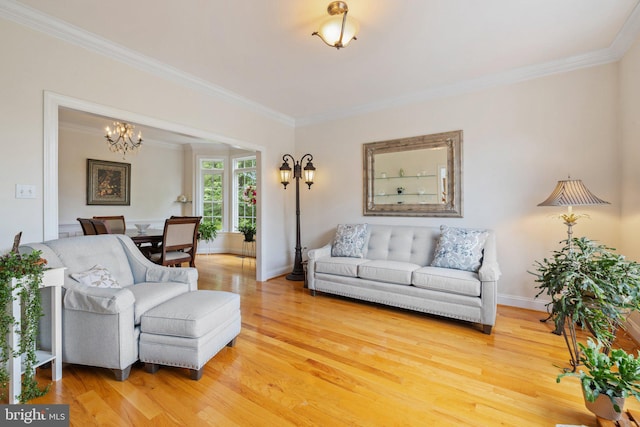 1399 N Royal Ave, Front Royal, VA 22630 - living area featuring crown molding, light wood finished floors, a chandelier, and baseboards