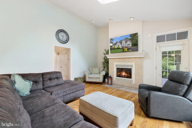 1399 N Royal Ave, Front Royal, VA 22630 - living area featuring a fireplace, high vaulted ceiling, and wood finished floors