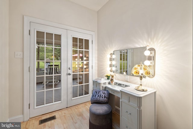 1399 N Royal Ave, Front Royal, VA 22630 - doorway featuring french doors, wood finished floors, and baseboards