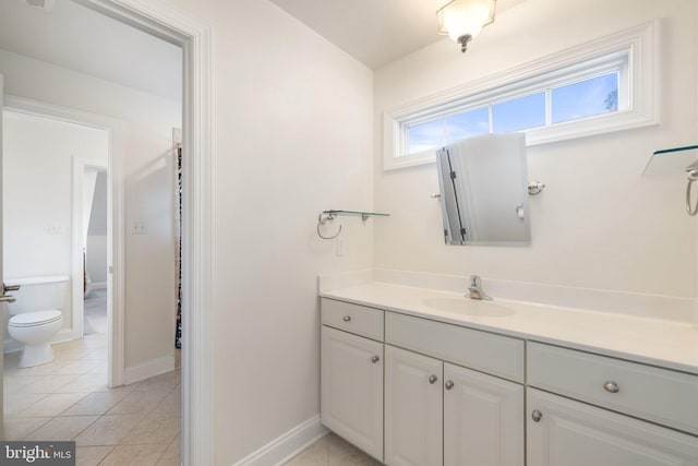 1399 N Royal Ave, Front Royal, VA 22630 - bathroom featuring toilet, vanity, tile patterned flooring, and baseboards