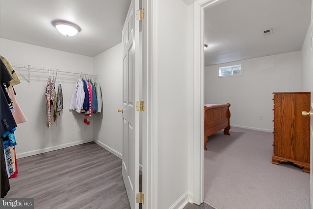 1399 N Royal Ave, Front Royal, VA 22630 - walk in closet featuring wood finished floors