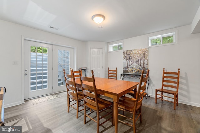1399 N Royal Ave, Front Royal, VA 22630 - dining area with wood finished floors, plenty of natural light, and baseboards